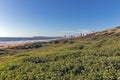 Dune Vegetation Beach and Sea against City Coastal Skyline Royalty Free Stock Photo