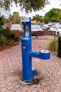 Dunedin, Florida, USA 11/8/19 A blue public drinking fountain, bottle refilling station and a bowl for dogs in a park