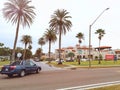 Dunedin, Florida, USA - December 27, 2018: Fenway luxury hotel in town of Dunedin in Florida surrounded by large tall palm trees.