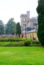 DUNEDIN, NEW ZEALAND - FEBR 10, 2015: foggy morning in the Garden of Larnach Castle Royalty Free Stock Photo