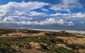 Dunes and clouds at Kijkduin in The Hague, Holland Royalty Free Stock Photo