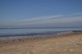 calm Baltic Sea after the storm - thrown stones and sea of amber Royalty Free Stock Photo