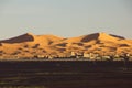 The Dunes Of Erg Chebbi Above The Merzouga Village In Morocco