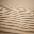 Dunes form rhythmic parallel ridges across the surface creating a Royalty Free Stock Photo