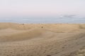 Dunes full of tourists on the Maspalomas beach in Gran Canaria Royalty Free Stock Photo