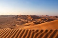 Waves in the dunes in the desert of Rub al Khali or Empty Quarter Royalty Free Stock Photo