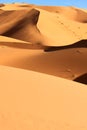 Dunes, sand and sky on Sahara Desert, Morocco. Vertical background. Royalty Free Stock Photo