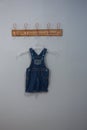 Dungaree hanging on hook