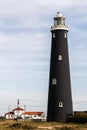 DUNGENESS, KENT/UK - FEBRUARY 3 : Lighthouse on the beach at Dun