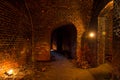 Dungeon under the old Prussian fortress illuminated by candles, Kaliningrad