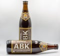 Dunkel ABK German dark beer bottles closeup on white Royalty Free Stock Photo