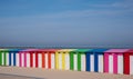 Dunkerque, France: Brightly colored striped beach huts on the sea front at Malo-Les-Bains beach in Dunkirk