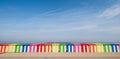 Dunkerque, France:. Candy colored striped beach huts on the sea front at Malo-Les-Bains beach in Dunkirk