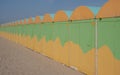 Dunkerque, France: Quirky green and yellow beach cabins on the sea front at Malo-Les-Bains beach in Dunkirk.