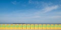 Dunkerque, France: Quirky green and yellow beach cabins on the sea front at Malo-Les-Bains beach in Dunkirk.