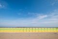 Dunkerque, France: Quirky green and yellow beach cabins on the sea front at Malo-Les-Bains beach in Dunkirk.