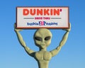 Dunkin Donuts alien holding sign