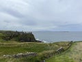 Dunluce Castle (/d?n?lu?s/; from Irish: DÃºn Libhse)[3] is a now-ruined medieval castle in Northern Ireland,