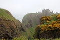 Dunnottar Castle in the fog, Scotland, UK Royalty Free Stock Photo