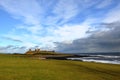 Dunstanburgh castle in Northumberland Royalty Free Stock Photo