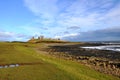 Dunstanburgh castle in Northumberland Royalty Free Stock Photo