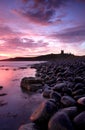 Dunstanburgh castle Sunrise Royalty Free Stock Photo
