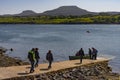 Dunvegan Loch Scotland UK. Tourists taking a small boat to view seals.