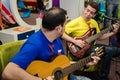 Duo band of guitarists who sing songs for children Royalty Free Stock Photo