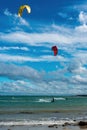 Duo of kitesurfers on the shores of the island of Chausey