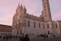 Duomo di Siena or Metropolitan Cathedral of Santa Maria Assunta at sunset light. Tuscany. Italy. Royalty Free Stock Photo