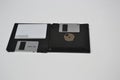 Floppy disk, 80s technology for recording data, front and back, white background, copy space