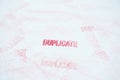DUPLICATE red rubber stamp Royalty Free Stock Photo
