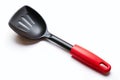 Durable Black Plastic Spatula and Ladle Set with Vibrant Red Handles Essential Kitchen Tools for Versatile Cooking Royalty Free Stock Photo