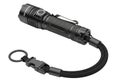 Durable black tactical flashlight with wrist strap and carabiner clip on a white background Royalty Free Stock Photo