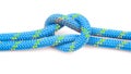 durable colored rope for climbing equipment on a white background. knot of braided cable. item for tourism and travel Royalty Free Stock Photo