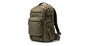 Olive green tactical backpack with multiple pockets and straps Royalty Free Stock Photo