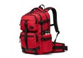 Durable red backpack with multiple compartments and sturdy straps for outdoor adventures isolated on white background Royalty Free Stock Photo