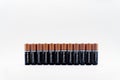 Duracell batteries in a raw on white background