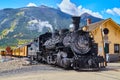Durango Silverton locomotive train in Colorado small town against large mountains Royalty Free Stock Photo