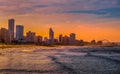 Durban golden mile beach with white sand and skyline South Africa during sunset sky