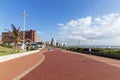 Beachfront Promenade against Blue Coudy Cityscape in Durban Royalty Free Stock Photo