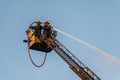 Fire and rescue firefighters combating a building fire