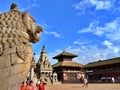 Durbar Square with statue of lion and temples, Bhaktapur, Nepal Royalty Free Stock Photo