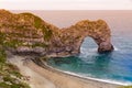 Durdle Door with beach, Jurassic Coast, England Royalty Free Stock Photo