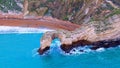 Durdle Door at the Jurassic coast in England - aerial view Royalty Free Stock Photo