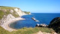 Durdle Door, one of the Jurassic Coast`s most iconic landscapes during summer season Royalty Free Stock Photo