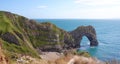 Durdle Door, one of the Jurassic Coast`s most iconic landscapes during summer season Royalty Free Stock Photo