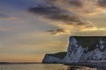 Durdle door - sunset - tourist place Royalty Free Stock Photo
