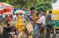 People wearing Mask in a Market place .