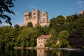 Durham England: 2022: Durham Cathedral exterior during sunny summer day. View from river wear with lush green trees